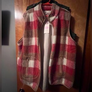 This is an entro brand vest new with tags. The size is a 3x.